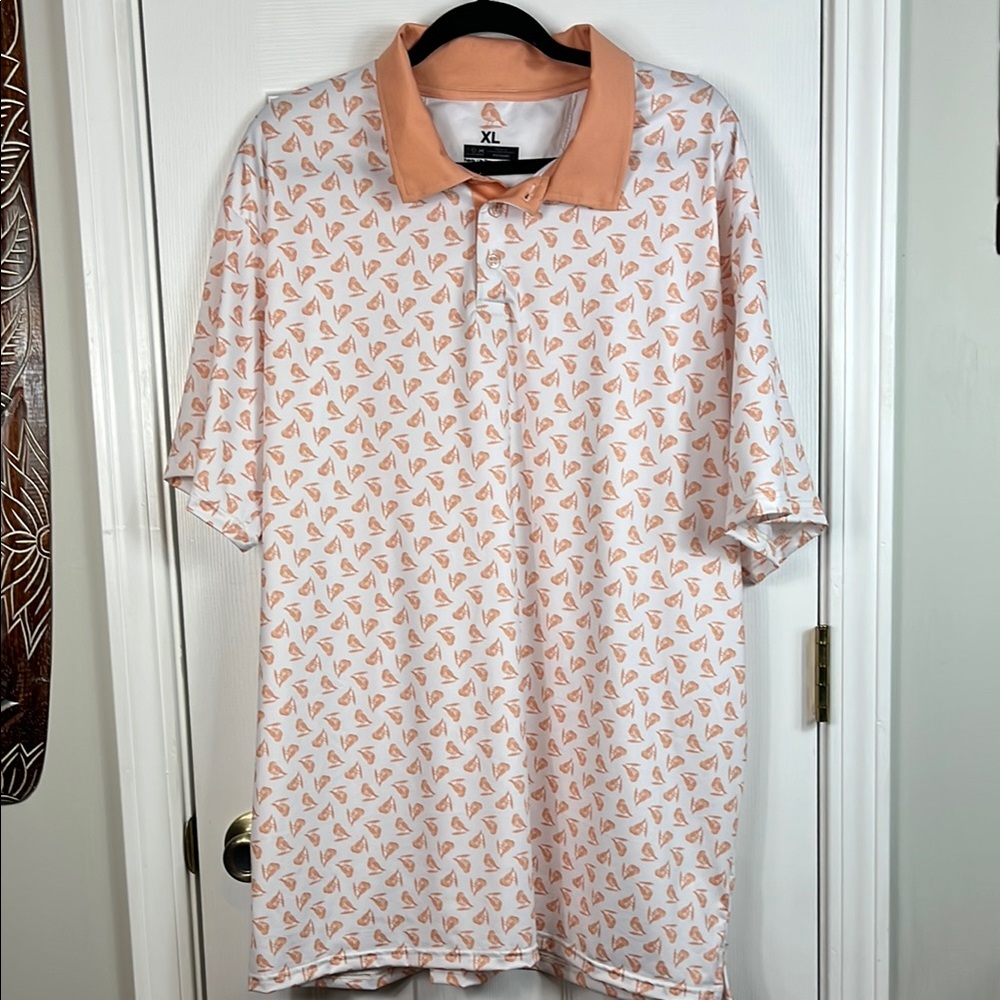 Peach/white short sleeved polo shirt size XL. Has a peach bird design all over.